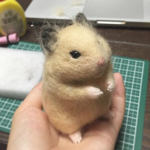 Custom-made adorable animal felted wool, perfect as a keepsake gift.