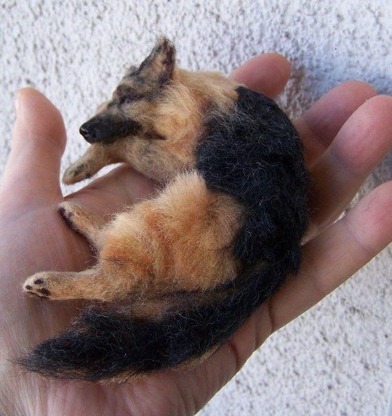 Custom-made adorable dog-themed felted wool, perfect as a keepsake gift.