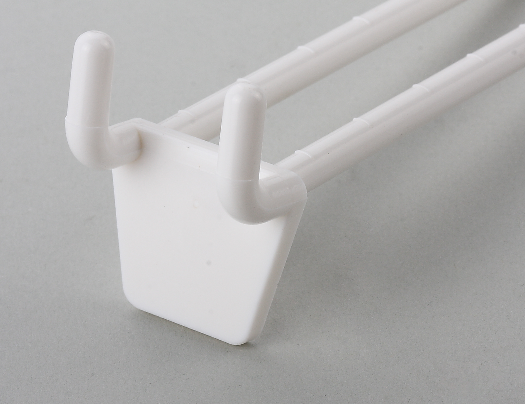 Pegboard Hooks vs. Slatwall Systems