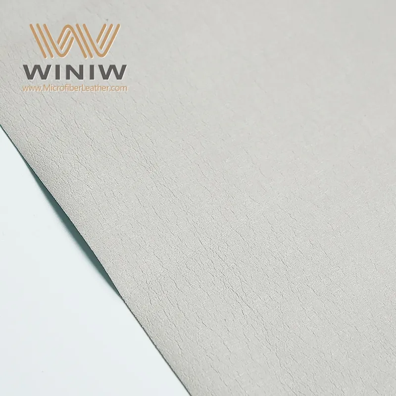 Bar chart comparing carbon footprint of cow skin leather, real leather, and synthetic leather