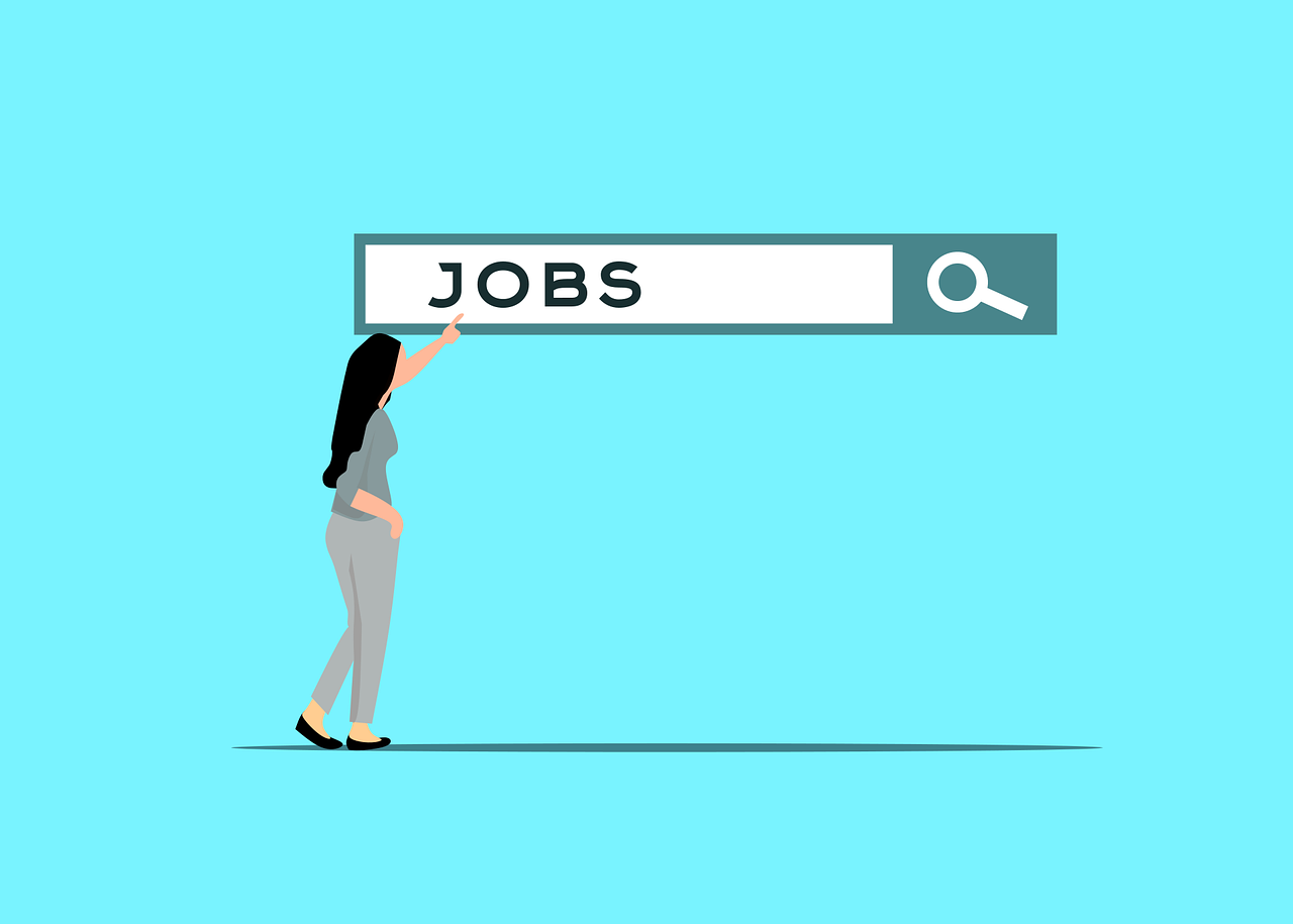 A woman stands in front of a search bar that containing the word "job"