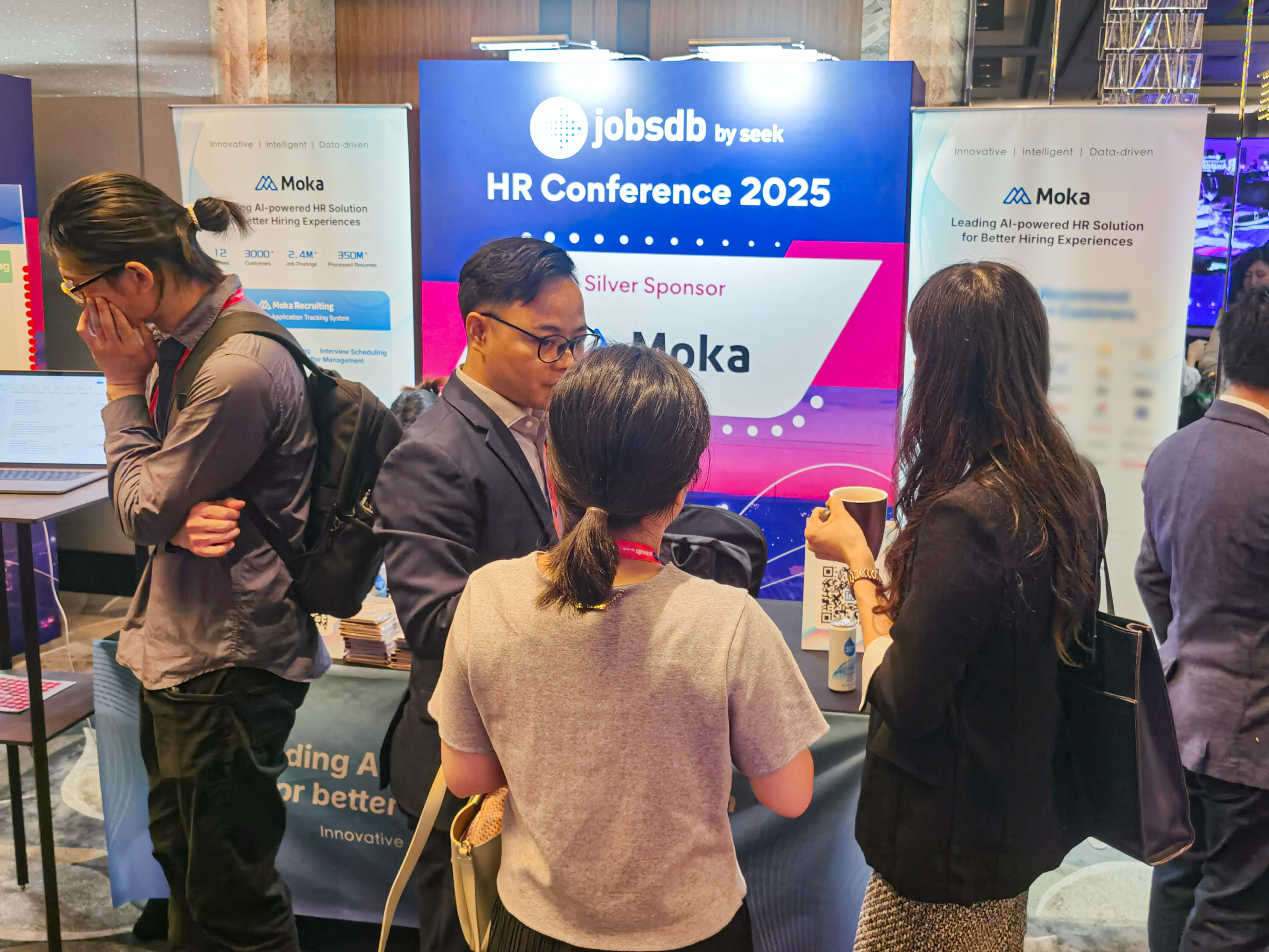 Attendees crowd the MokaHR booth at the JobsDB HR Conference 2025.