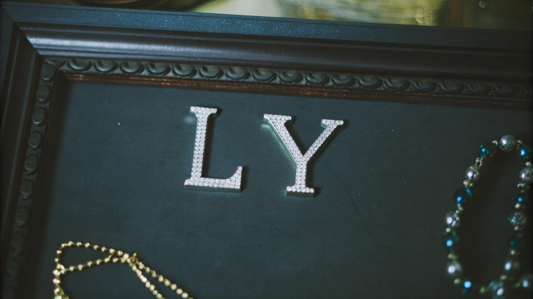 Jewelry with her initials or a special date
