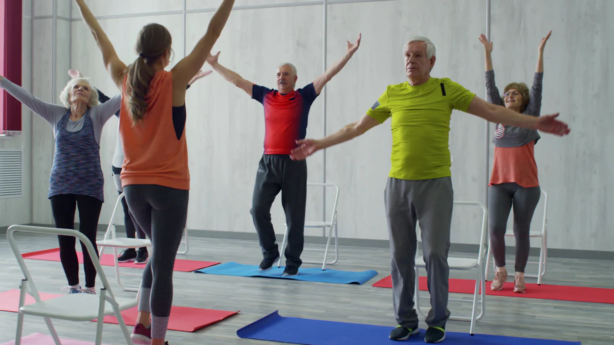 A group of people, some of whom are super agers, standing on mats with their hands up.