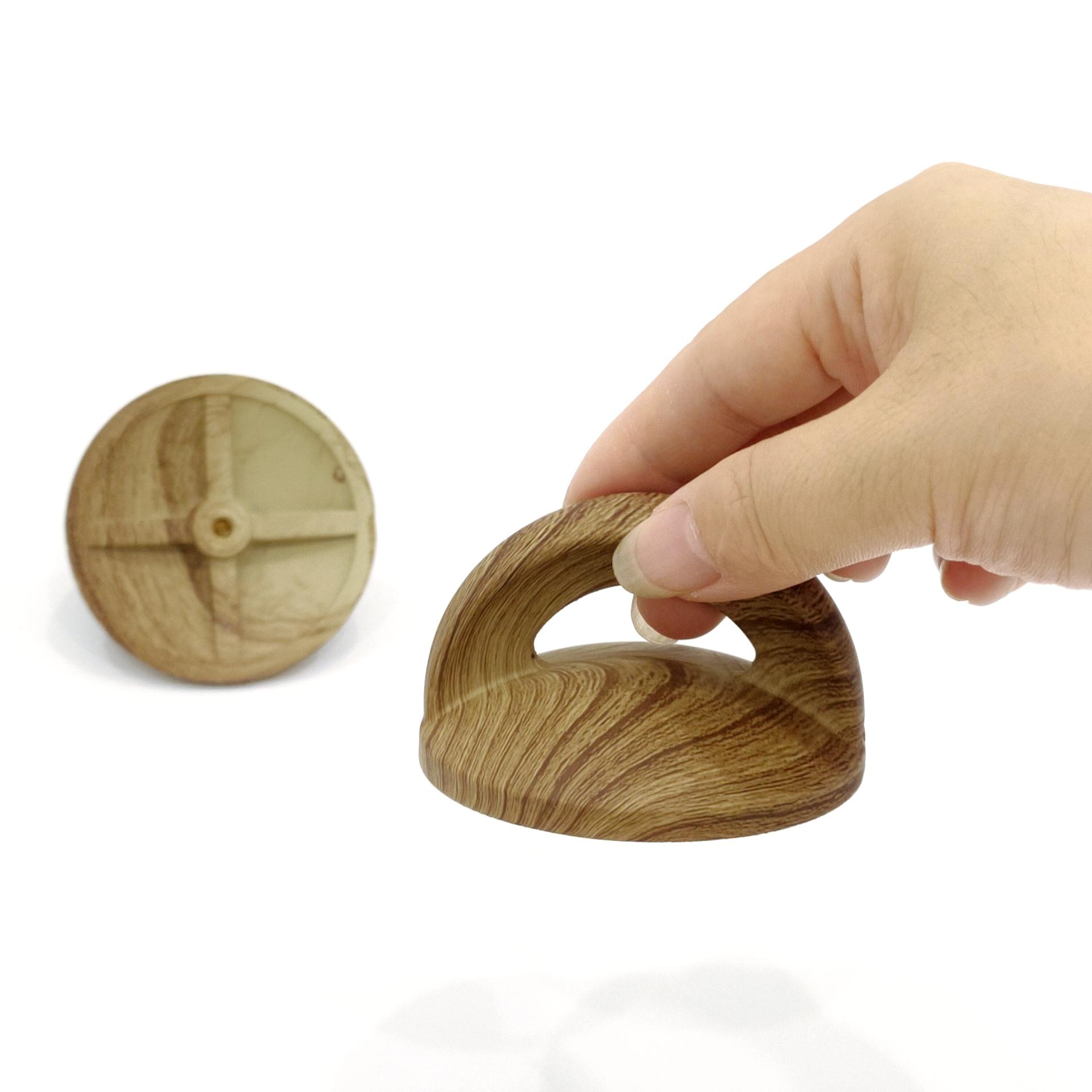 What Benefits Does a Bakelite Knob with Wood Effect Offer for Kitchen Lids