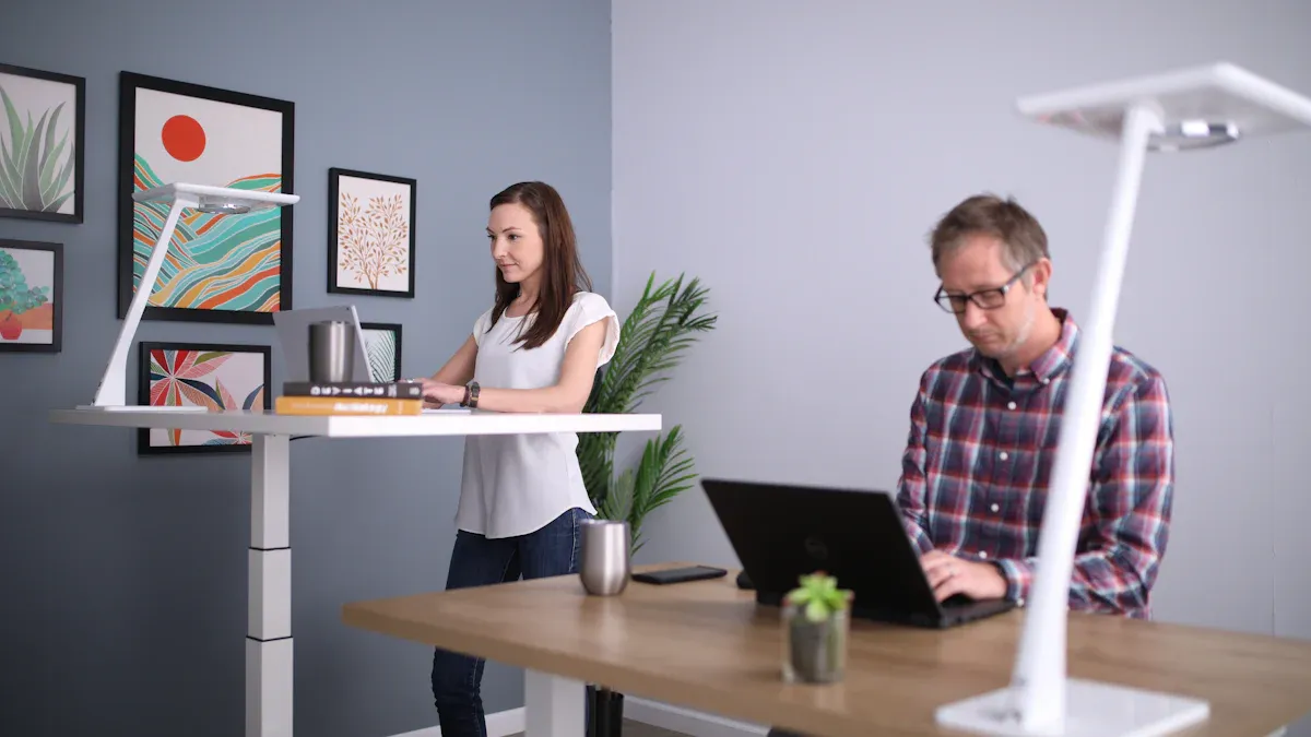 What is a pneumatic sit-stand desk, and how does it work