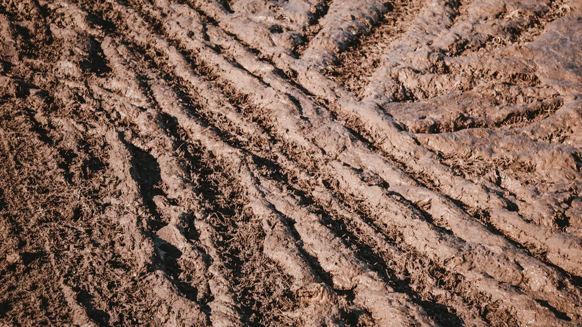 Performance of Skid Steer Loader Tracks in Mud