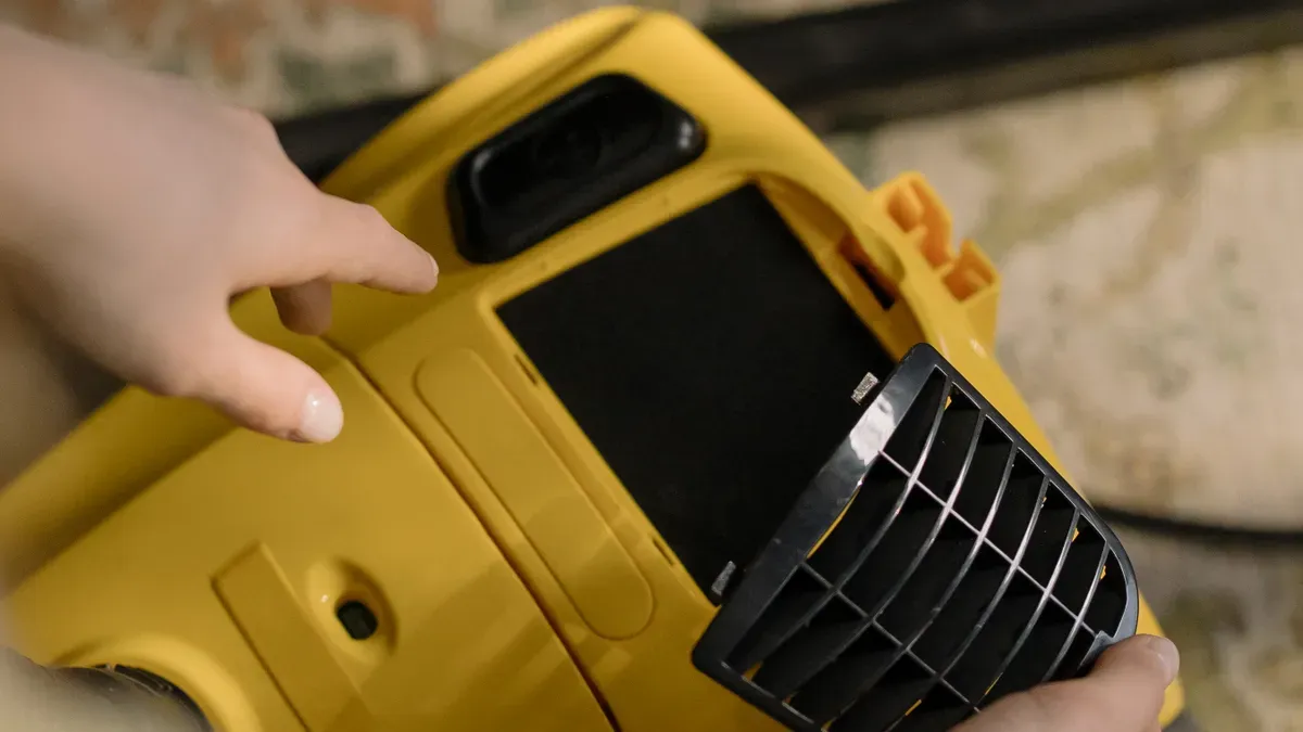 Close-up of mesh ventilation panel placement on a dog carrier side wall