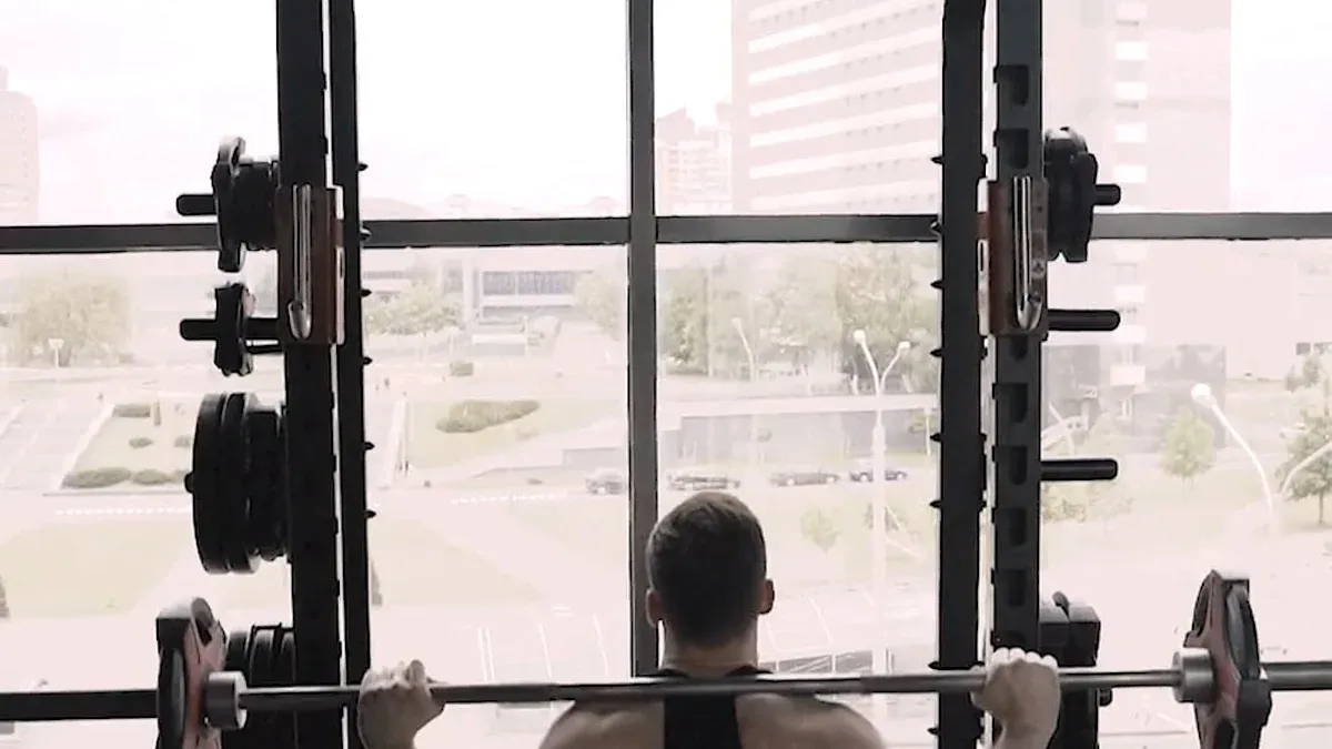How much does a smith machine bar weigh