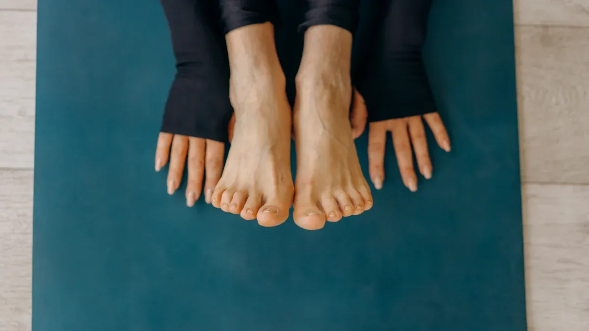 Can I wear socks during yoga practice or should I go barefoot?