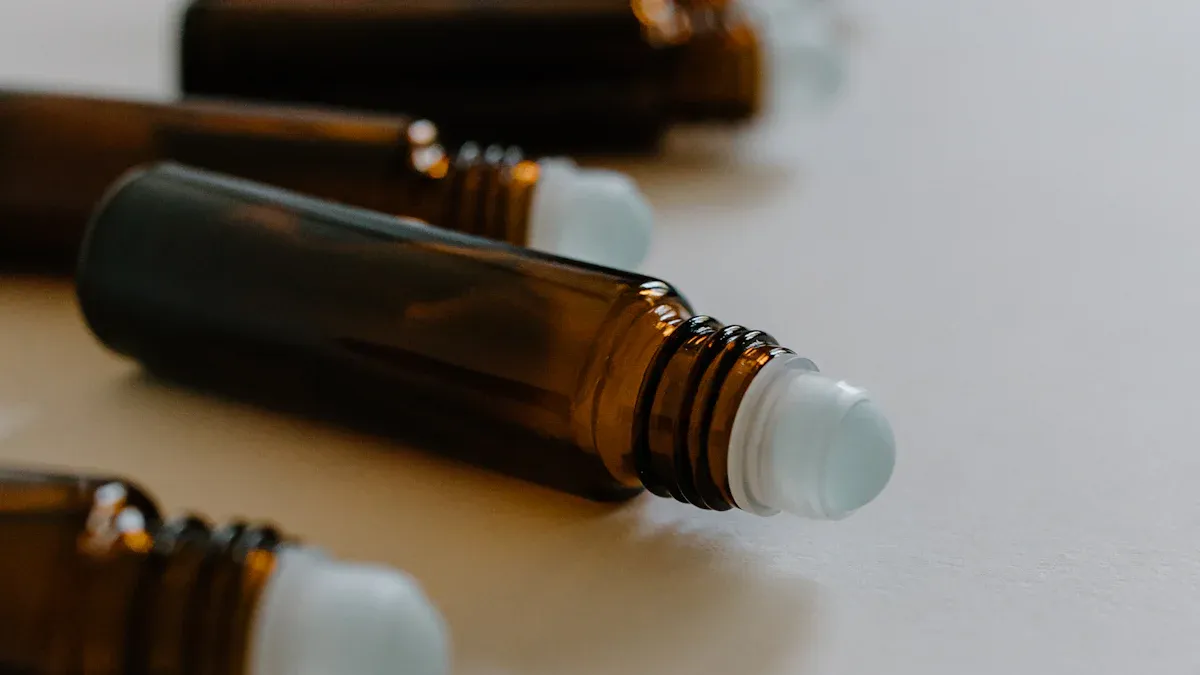 Which types of bottles are most suitable for holding essential oils?