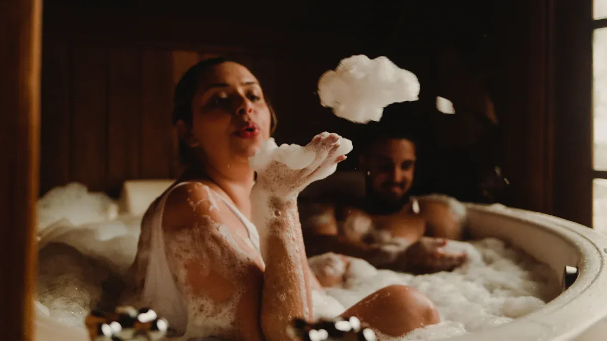 A couple is bathing in the bathtub, the girl is blowing bubbles in her hand