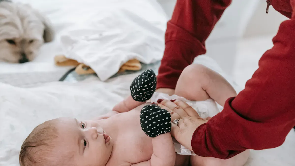 How to Change a Newborn' style=