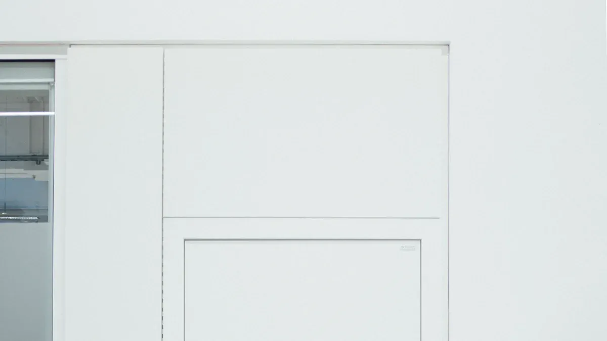What Makes an Invisible Fire Door Different from Standard Fire Doors | Foshan Qi'an Fireproof Shutter Doors Co.,Ltd. Invisible Fire Door Design