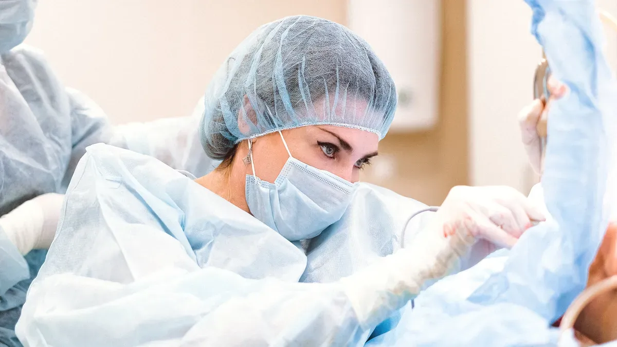 surgical team preparing for cesarean section with wound protection