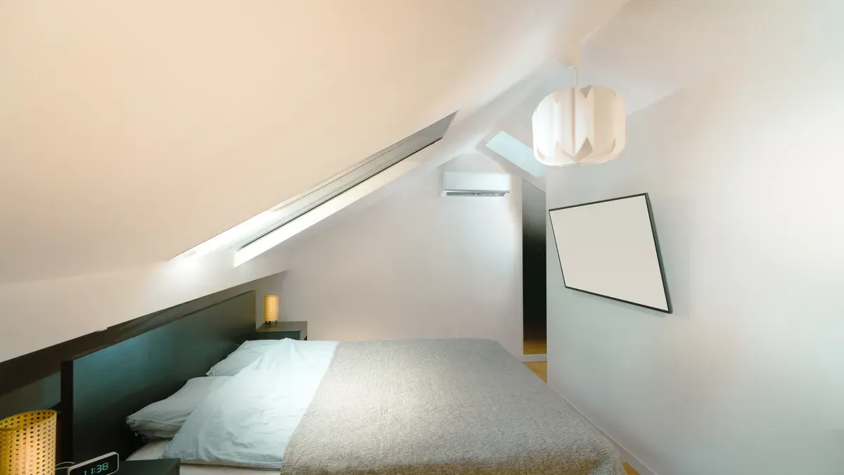 Adjustable fixtures for sloped ceiling lighting