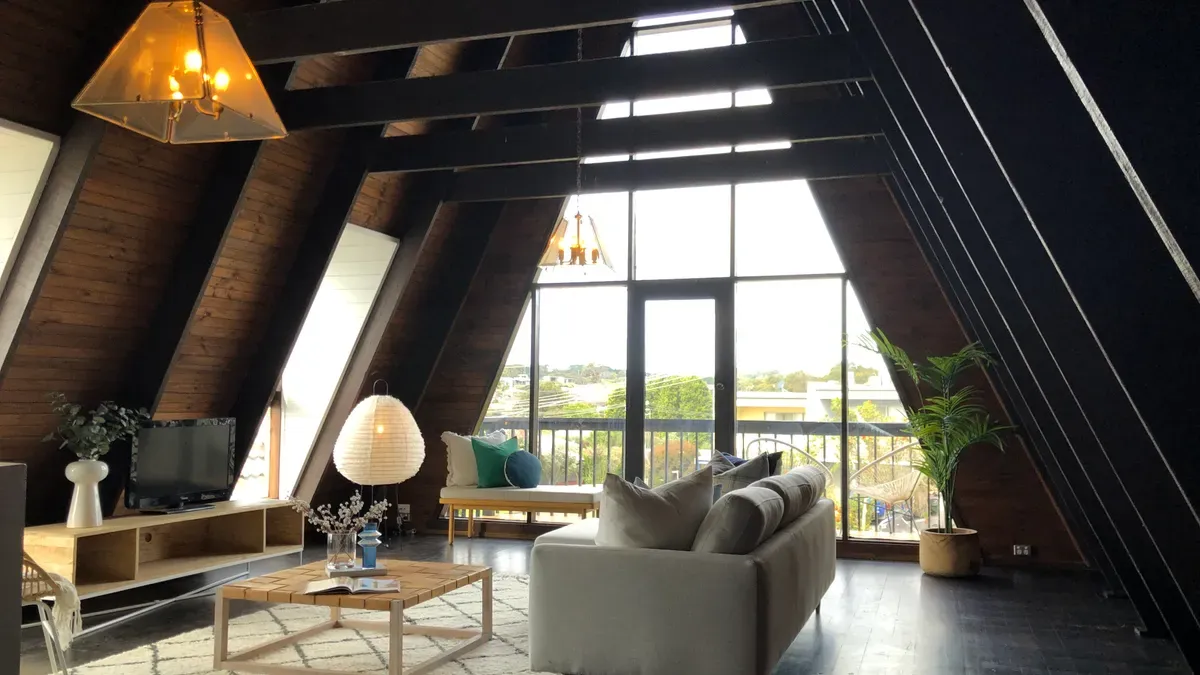 Pendant placement for inclined ceiling lighting