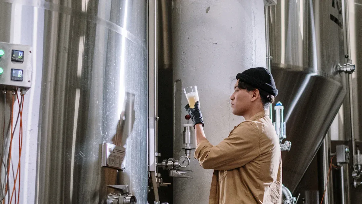 Which microbe is employed for commercial production of fumaric acid?