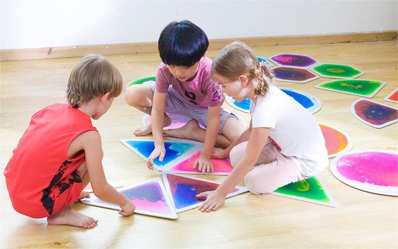 Sensory play steps with liquid tiles