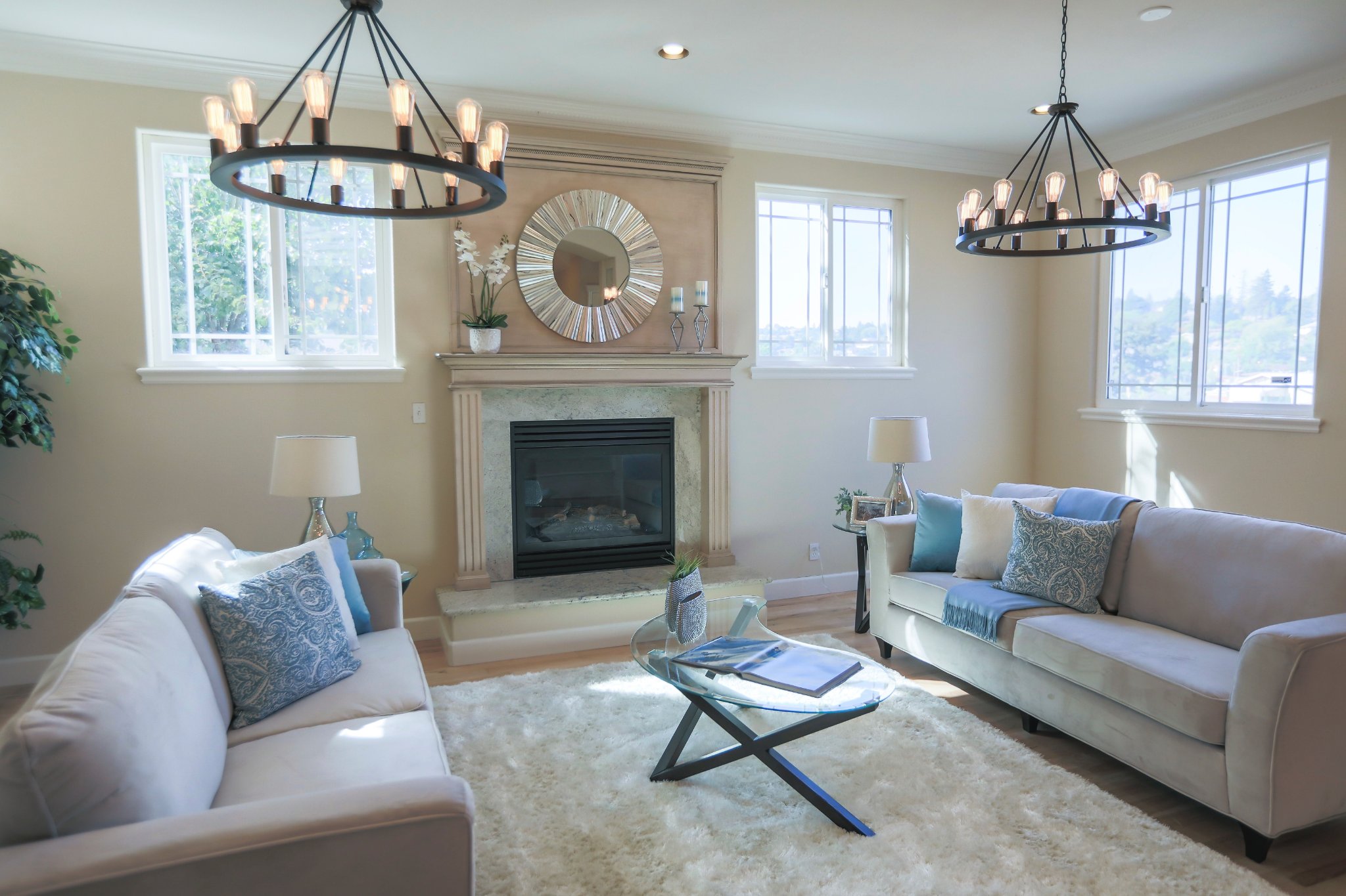 Contemporary living room interior featuring a ceiling light fixture and comfortable seating area