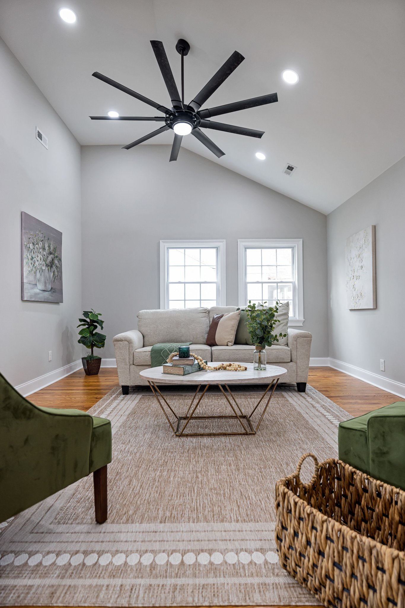 Modern living room with ceiling fan and integrated lighting